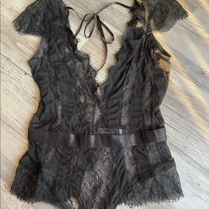 Never worn! Black lace lingerie bodysuit size M